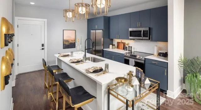 a living room with furniture a window and gym equipment