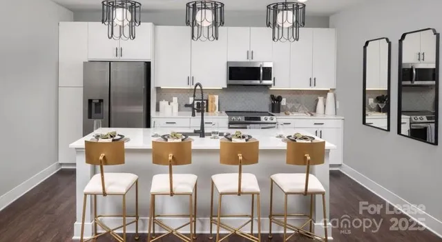 a view of entryway and wooden floor