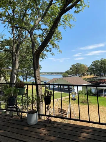 a view of swimming pool from a balcony