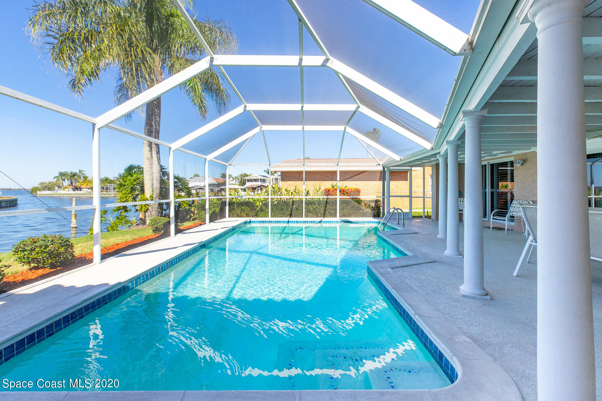 43 Country Club Road Cocoa Beach, FL 32931 - Photo 30 of 35 a view of a backyard