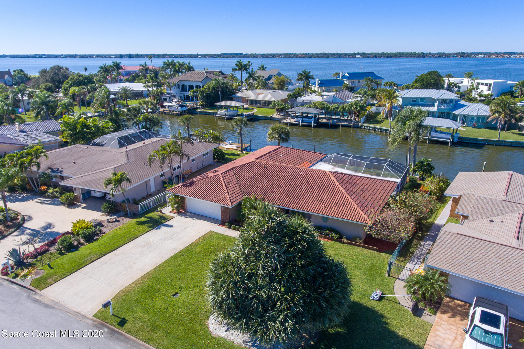 43 Country Club Road Cocoa Beach, FL 32931 - Photo 4 of 35 an aerial view of a house with a lake view