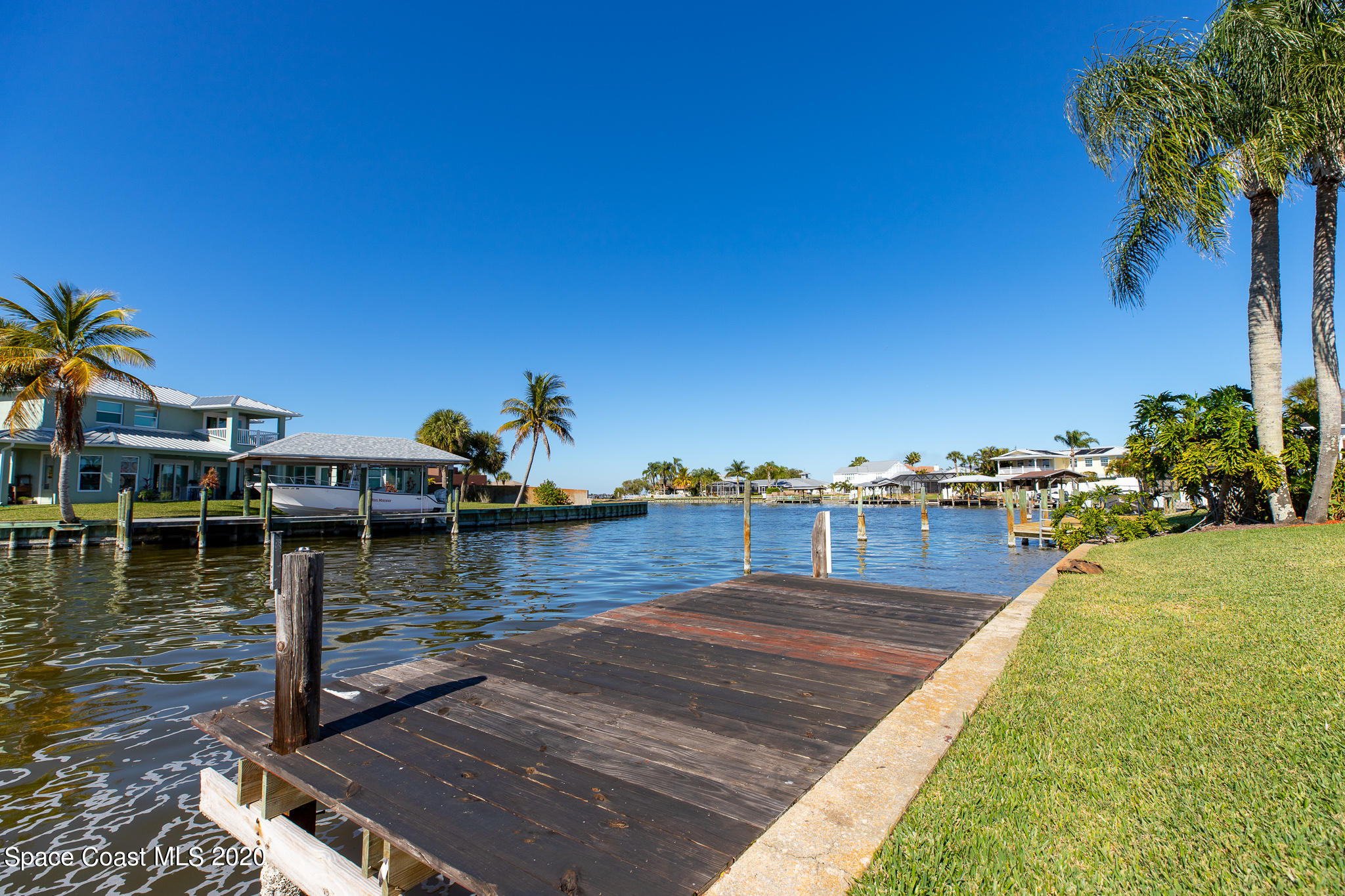 43 Country Club Road Cocoa Beach, FL 32931 - Photo 32 of 35 a view of a house with pool