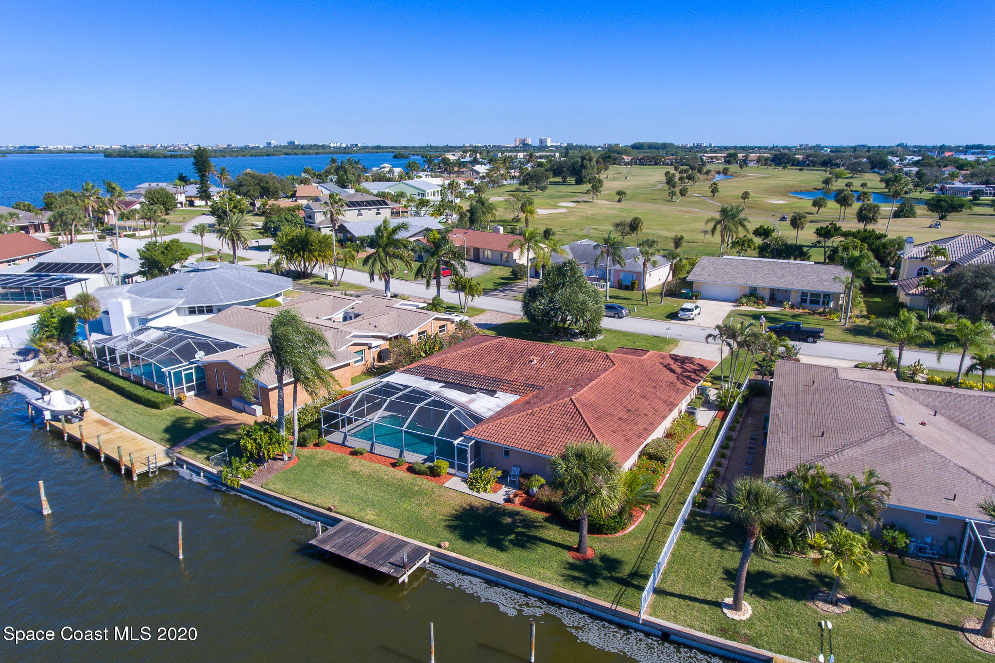 43 Country Club Road Cocoa Beach, FL 32931 - Photo 5 of 35 an aerial view of residential houses with outdoor space