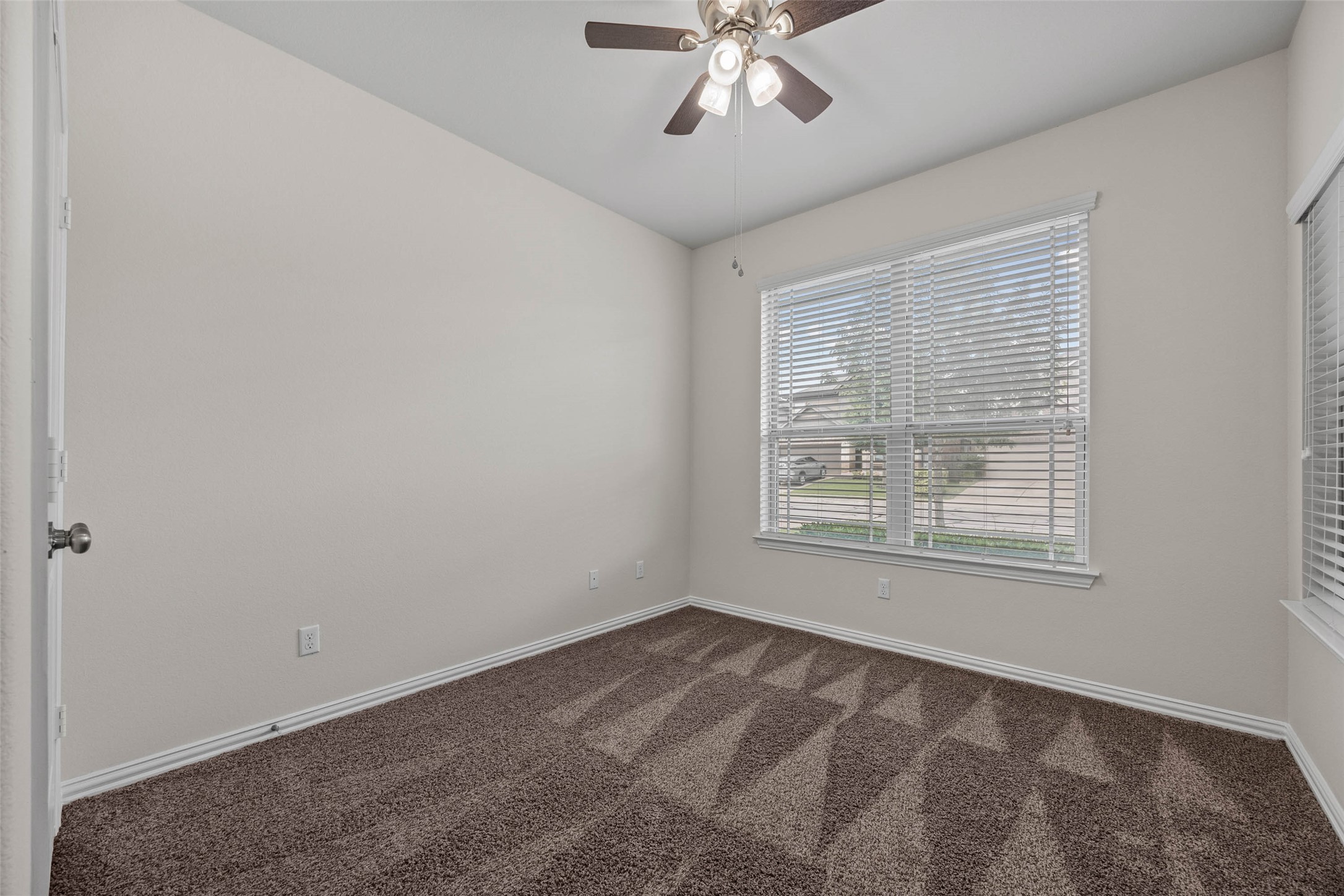 536 Rancho Verde Drive Leander, TX 78641 - Photo 12 of 37 a view of an empty room with a window