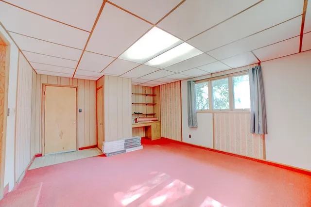 a view of empty room with windows