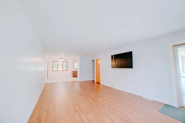 a view of a livingroom with a flat screen tv