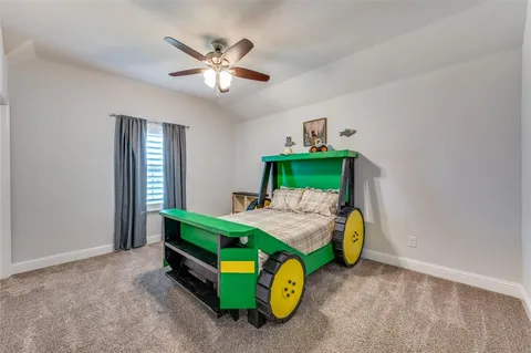 a bathroom with a double vanity sink and mirror