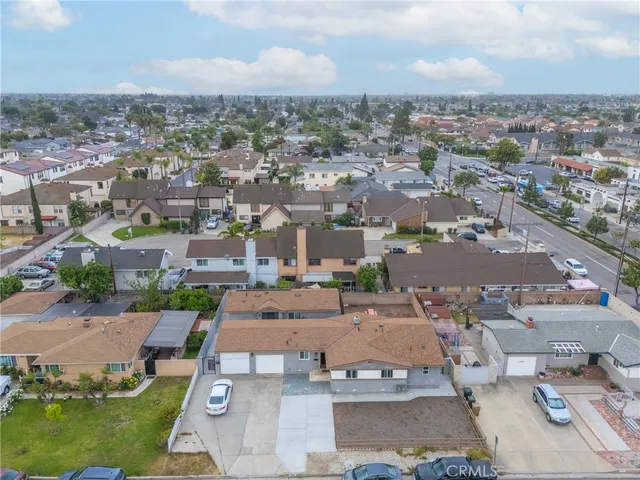 an aerial view of a city with lots of residential buildings