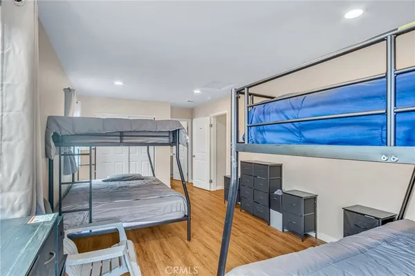 a bed room with furniture and a fireplace