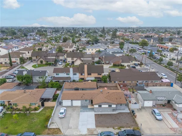 an aerial view of a city with lots of residential buildings