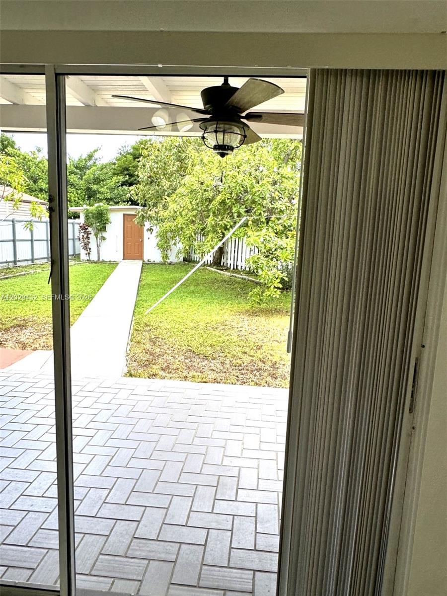 15084 Southwest 62nd Street, Unit 15084 Miami, FL 33193 - Photo 21 of 29 View from Kitchen area into yard.