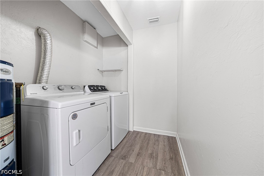 2335 50th Terrace Southwest Naples, FL 34116 - Photo 15 of 26 a utility room with dryer and washer