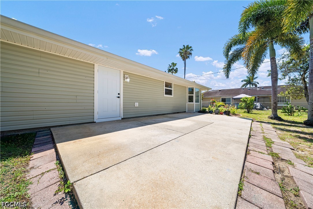 2335 50th Terrace Southwest Naples, FL 34116 - Photo 17 of 26 a view of a backyard of a house