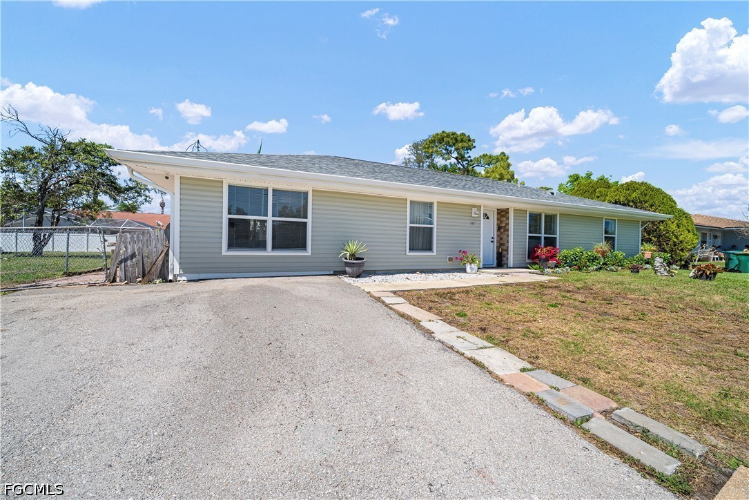 2335 50th Terrace Southwest Naples, FL 34116 - Photo 20 of 26 a view of a house with a patio