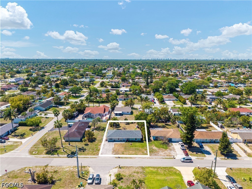 2335 50th Terrace Southwest Naples, FL 34116 - Photo 23 of 26 an aerial view of residential houses with outdoor space