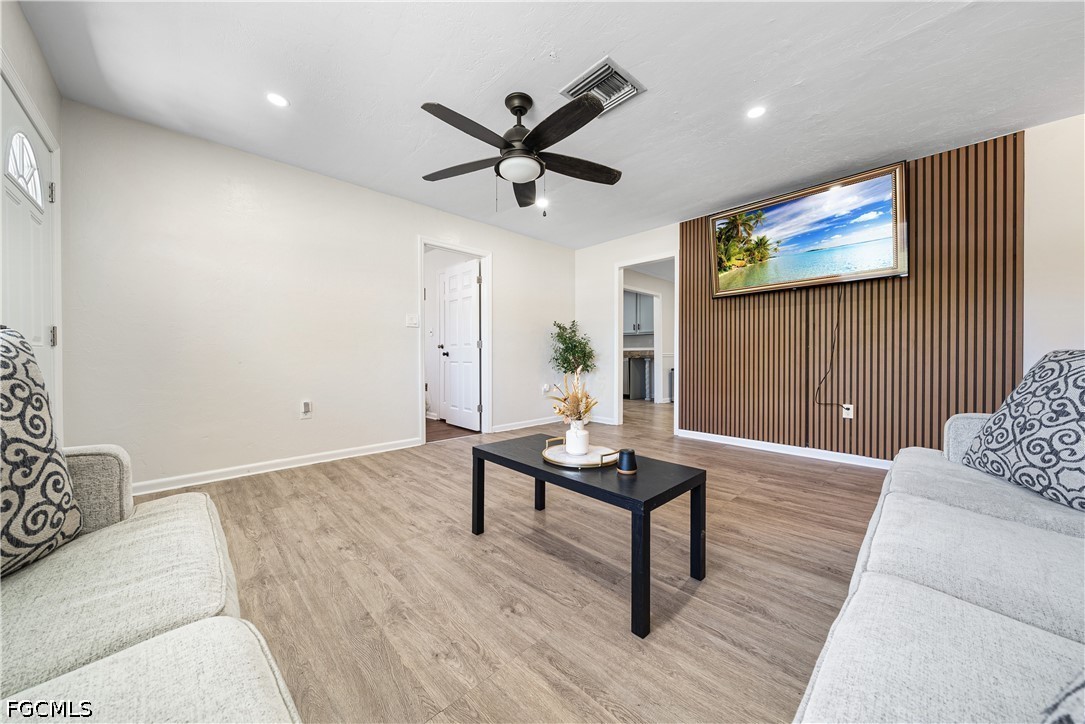 2335 50th Terrace Southwest Naples, FL 34116 - Photo 4 of 26 a living room with furniture