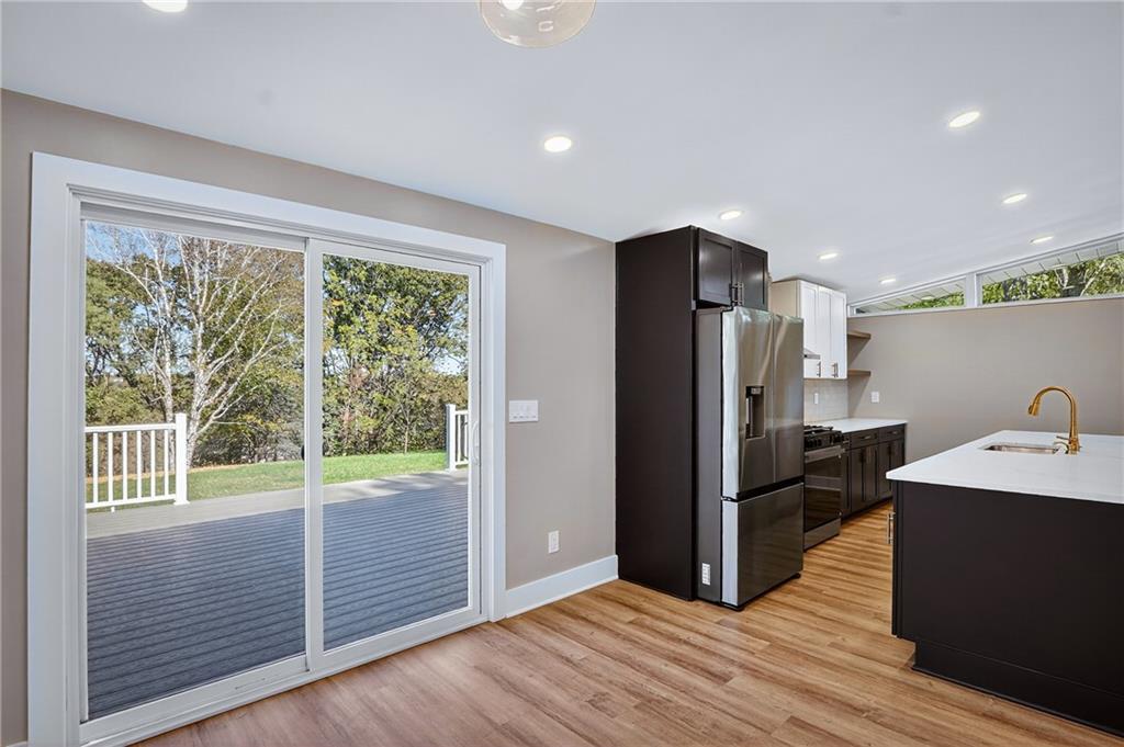 10390 Meinert Road Wexford, PA 15090 - Photo 11 of 42 a kitchen with stainless steel appliances granite countertop a refrigerator and a sink