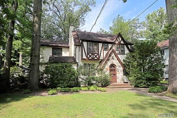 19 Cary Road Great Neck, NY 11021 - Photo 1 of 1 a view of a house with yard and plants