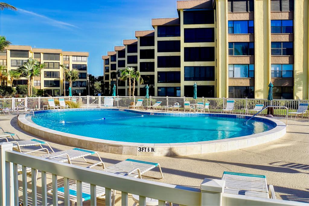 8767 Midnight Pass Road, Unit 101F Sarasota, FL 34242 - Photo 38 of 63 a view of pool with outdoor seating