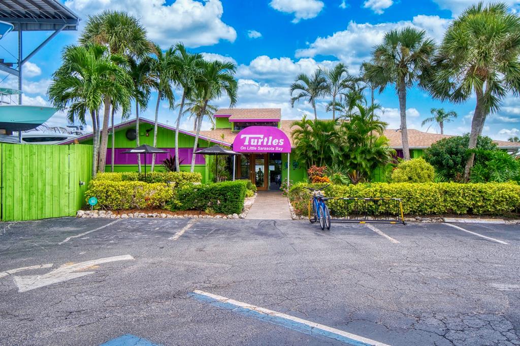 8767 Midnight Pass Road, Unit 101F Sarasota, FL 34242 - Photo 62 of 63 a view of backyard with green space