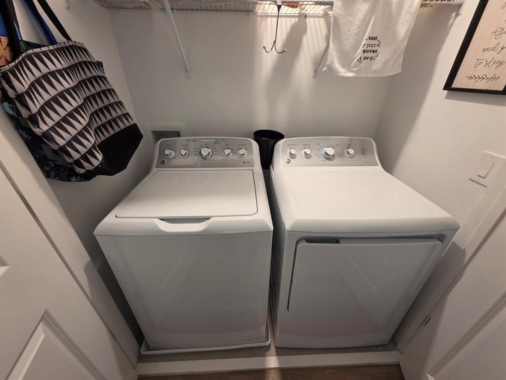 3318 Composition Street Kissimmee, FL 34758 - Photo 17 of 28 a utility room with dryer and washer