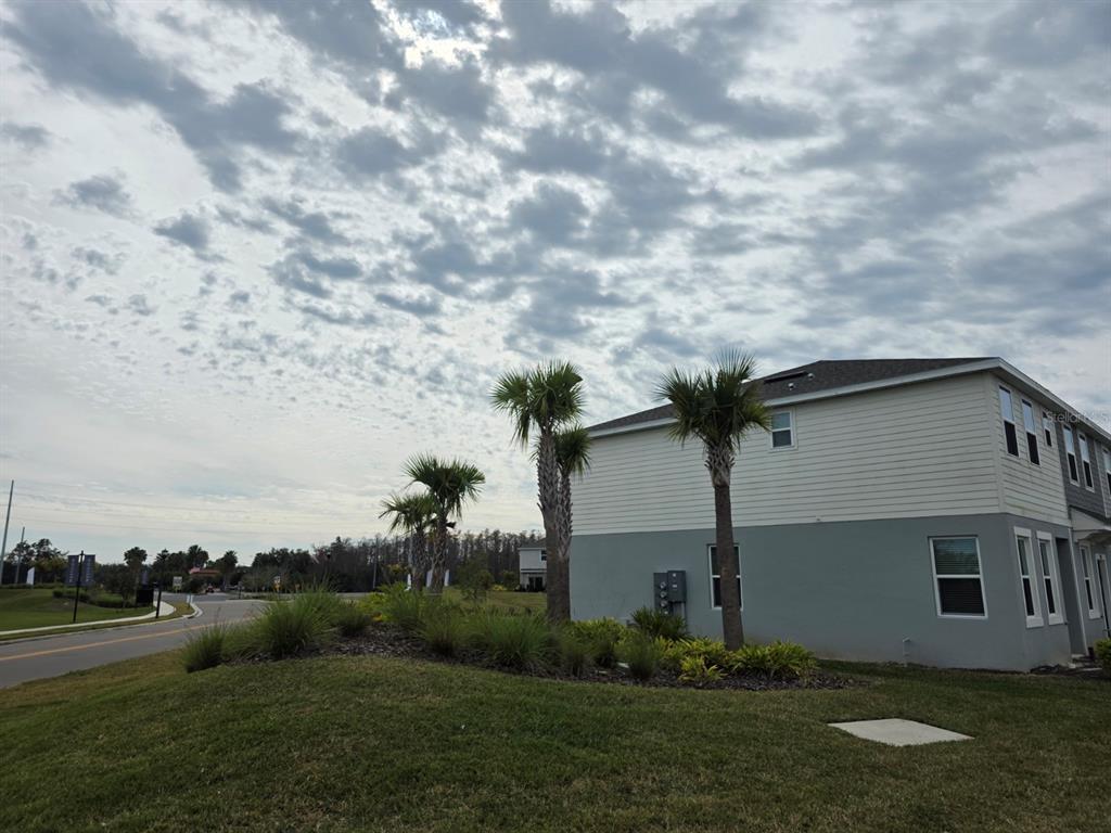 3318 Composition Street Kissimmee, FL 34758 - Photo 28 of 28 a view of a yard in front of a house