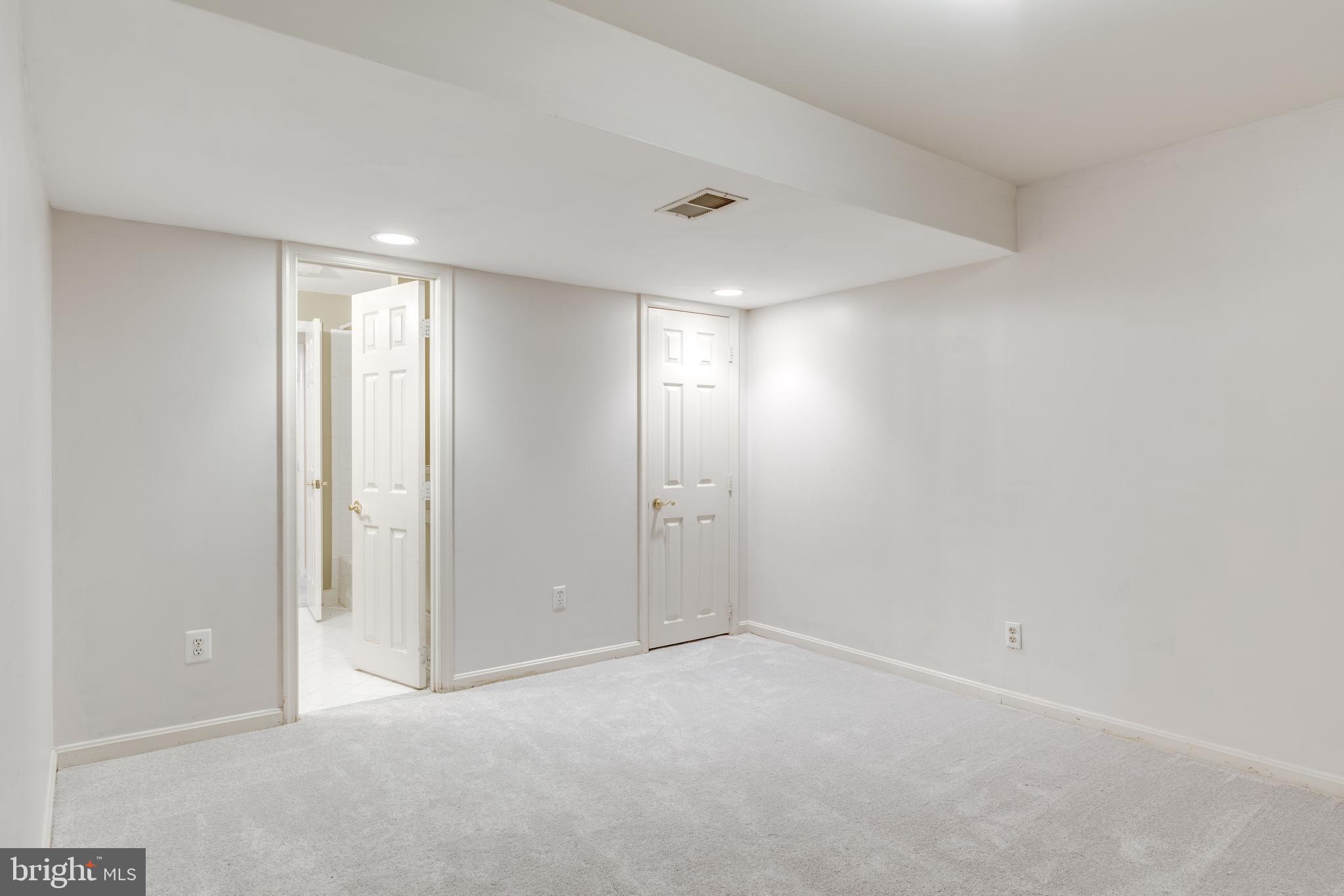 1224 Bishopsgate Way Reston, VA 20194 - Photo 46 of 65 Lower Level Den / Gym Area with En-Suite Bathroom