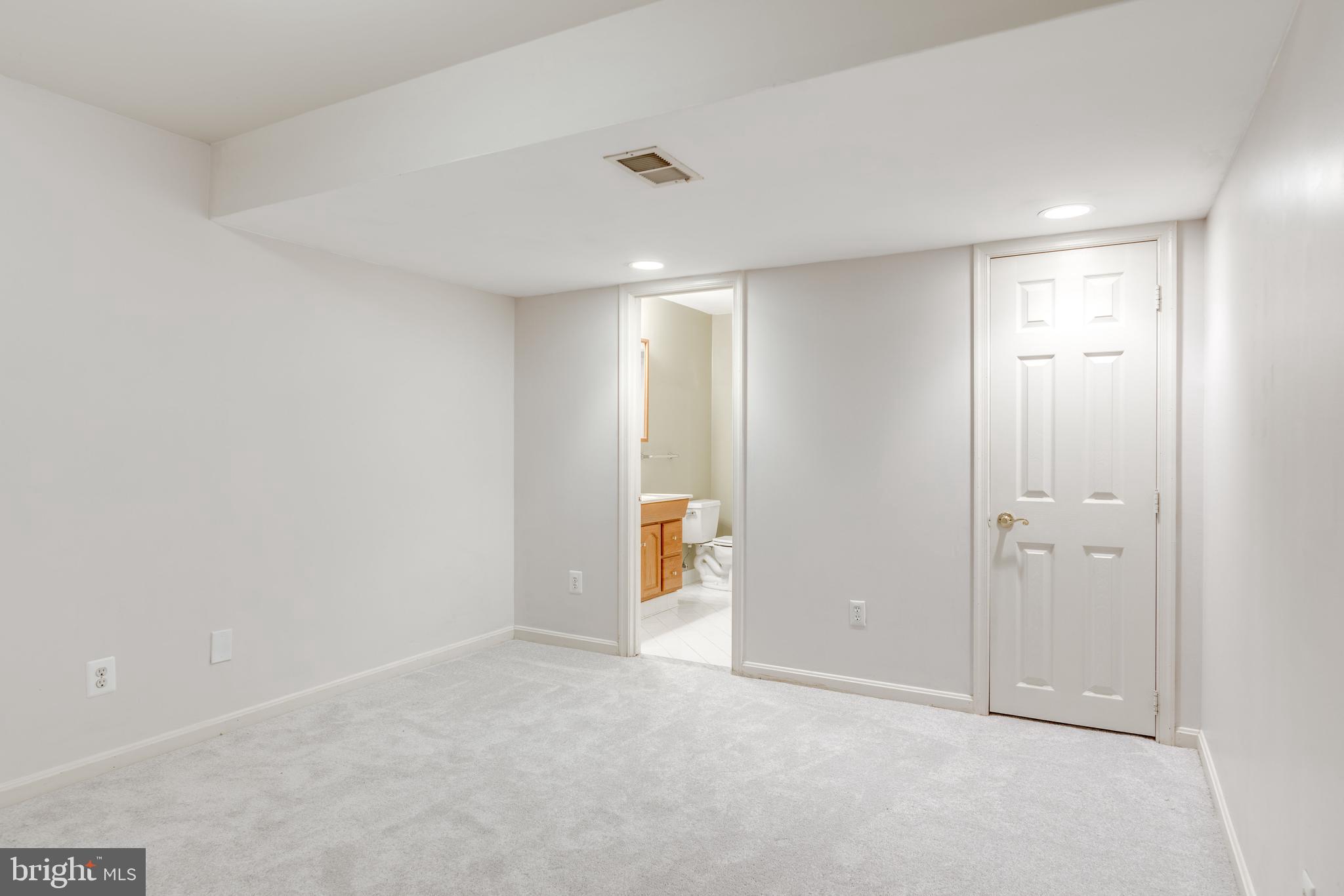 1224 Bishopsgate Way Reston, VA 20194 - Photo 47 of 65 Lower Level Den / Gym Area with En-Suite Bathroom