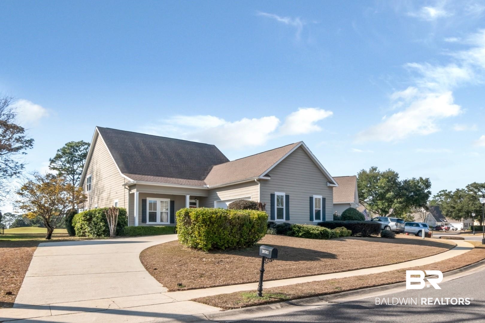 30585 Pine Court Daphne, AL 36527 - Photo 1 of 49 View of front facade featuring concrete driveway and a porch