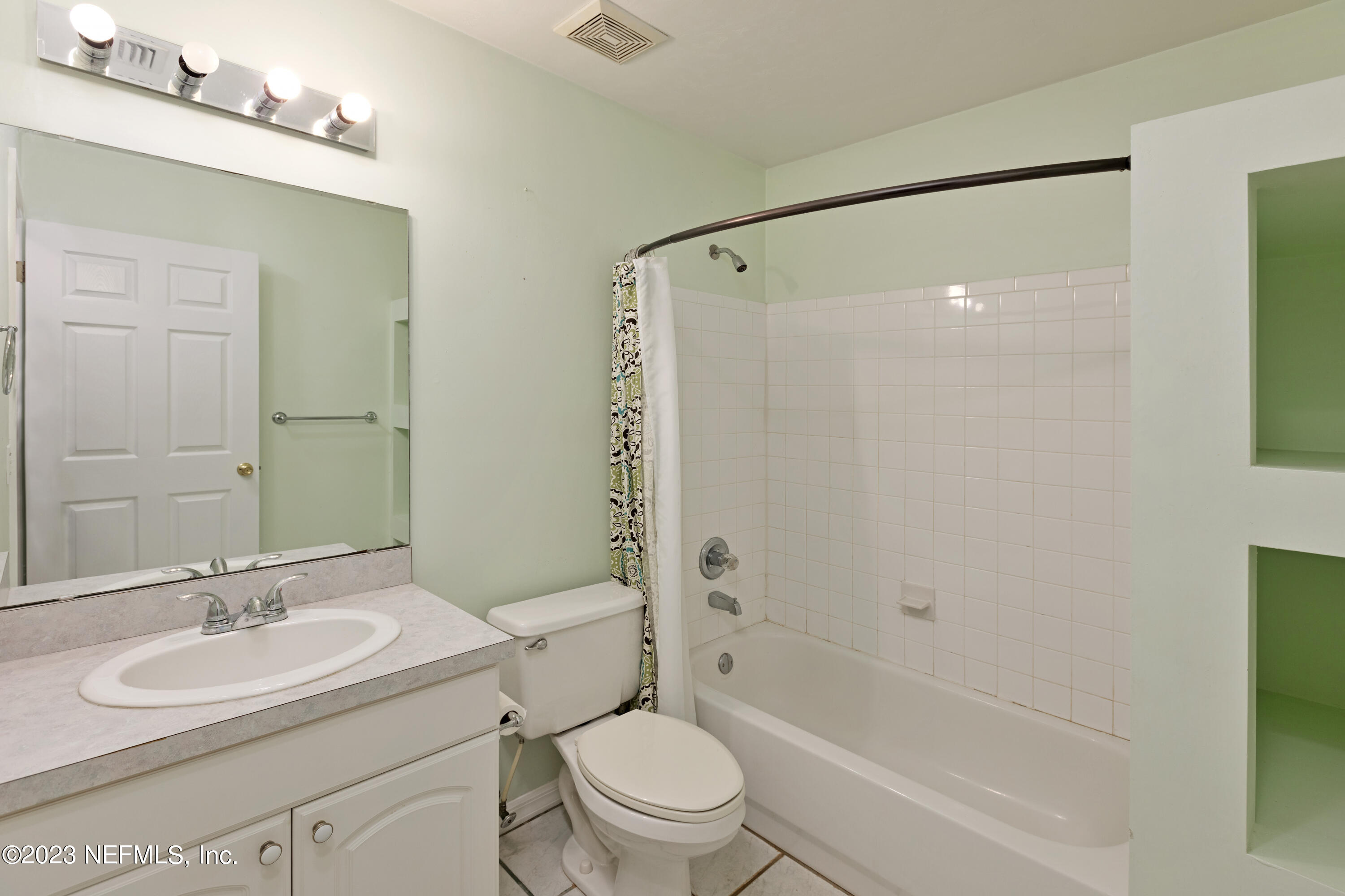 445 Southeast 28th Loop Melrose, FL 32666 - Photo 44 of 75 a bathroom with a sink toilet and shower