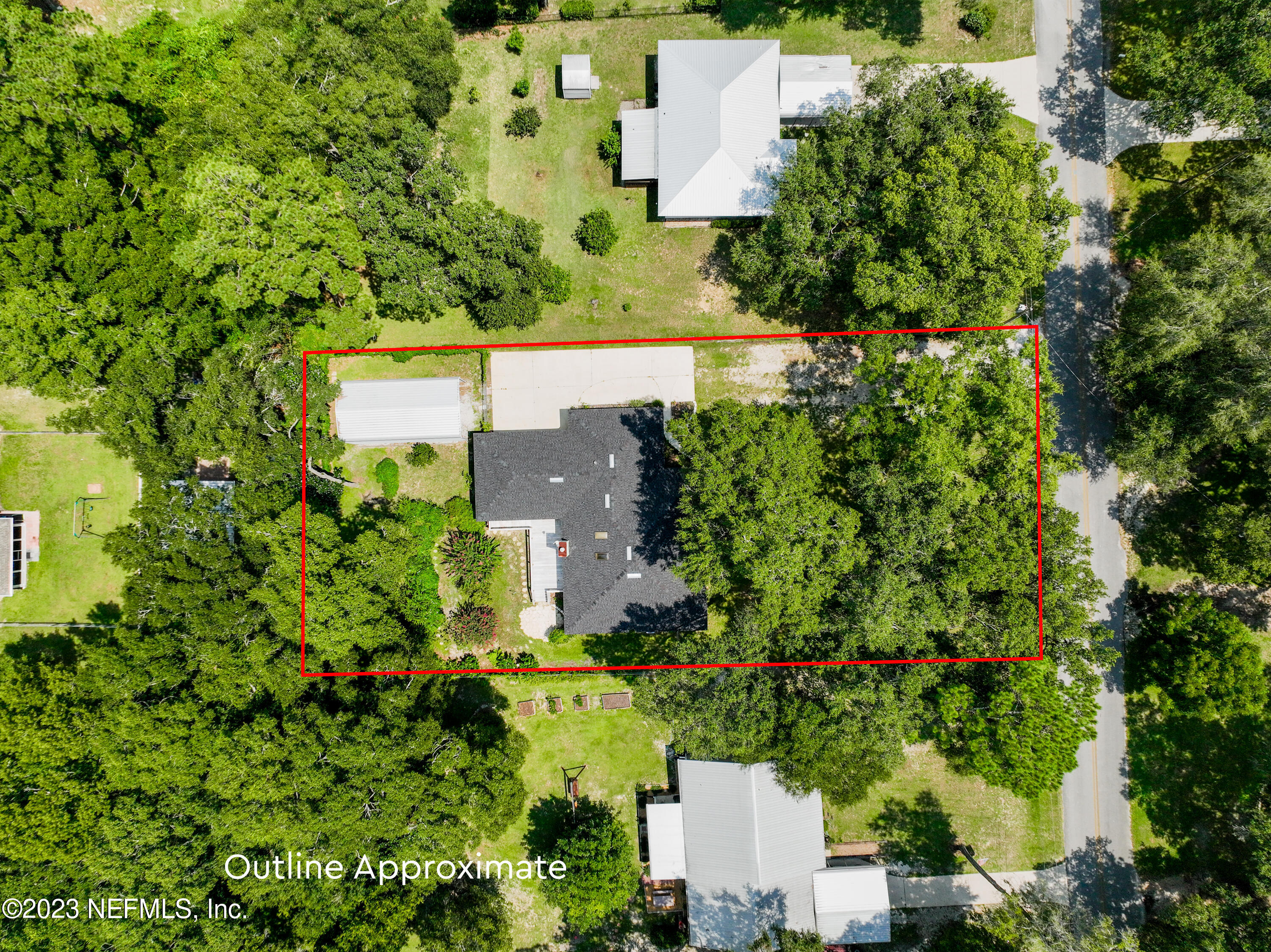 445 Southeast 28th Loop Melrose, FL 32666 - Photo 71 of 75 an aerial view of residential house with outdoor space and trees all around