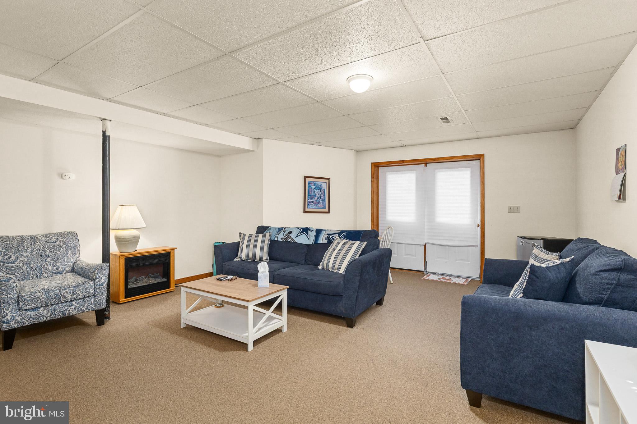 21246 Clarks Mountain Road Rapidan, VA 22733 - Photo 27 of 38 a living room with furniture and a window