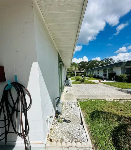 a view of yard with patio