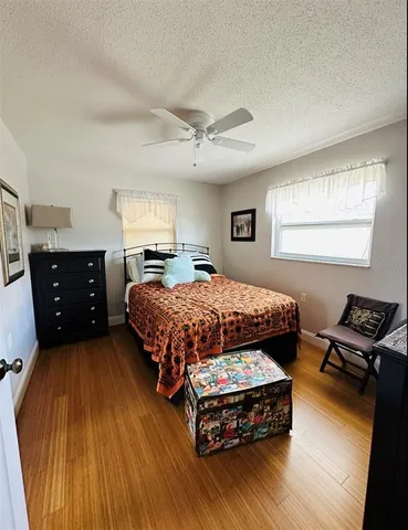 a bedroom with a bed and furniture