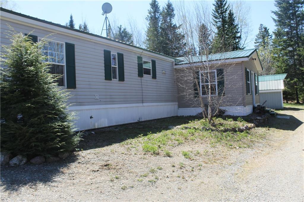 465 South Patten Road Patten, ME 04765 - Photo 1 of 14 New roof, nice outbuilding ,lupines,...