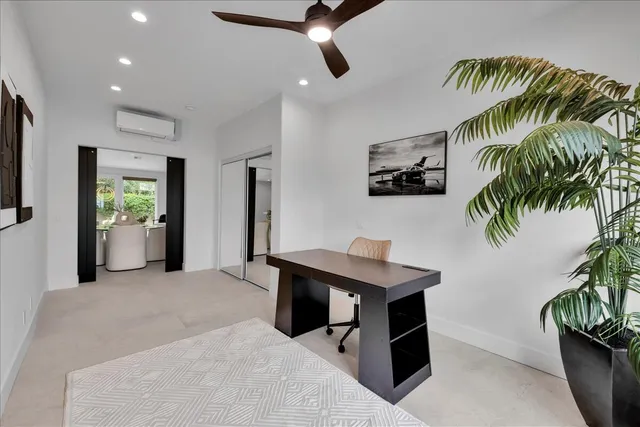 a view of a hallway with wooden shelves