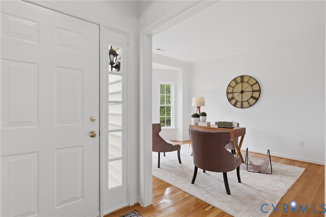 1700 Rolfield Way Henrico, VA 23238 - Photo 2 of 44 a view of a room with a table and a chair