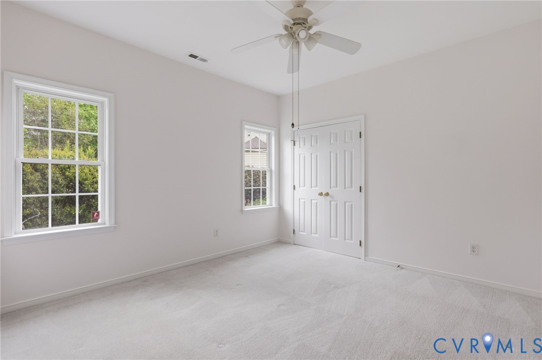 1700 Rolfield Way Henrico, VA 23238 - Photo 28 of 44 a view of an empty room with a window