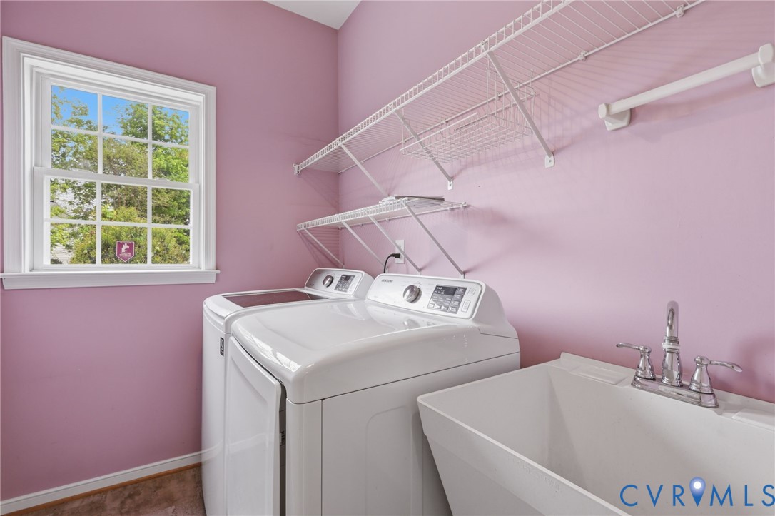 1700 Rolfield Way Henrico, VA 23238 - Photo 30 of 44 a bathroom with a sink and a bathtub