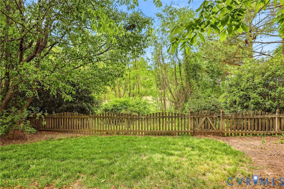 1700 Rolfield Way Henrico, VA 23238 - Photo 40 of 44 a view of a backyard with a tree