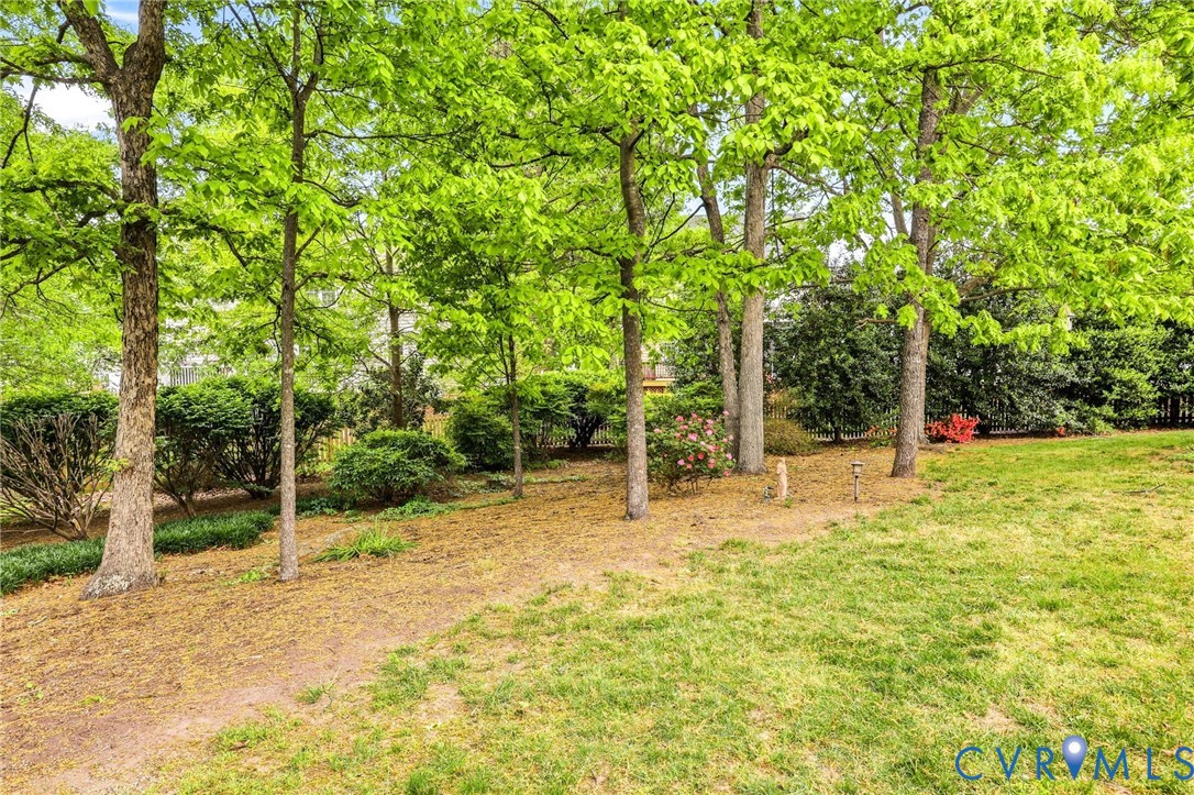 1700 Rolfield Way Henrico, VA 23238 - Photo 41 of 44 a house with trees in front of it