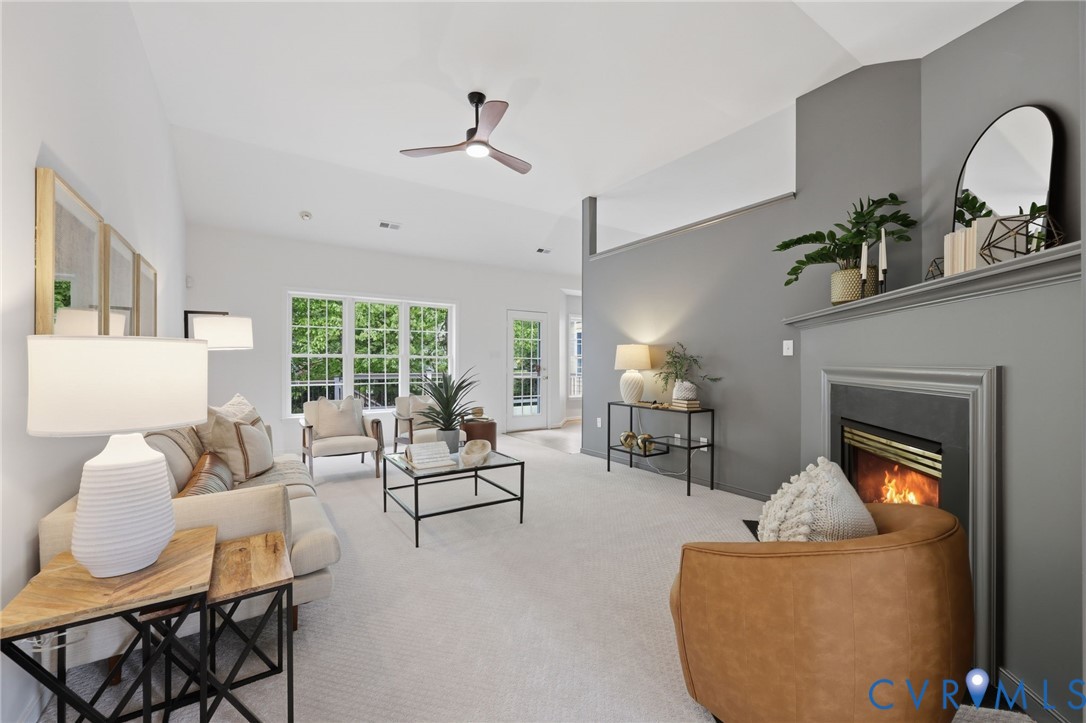 1700 Rolfield Way Henrico, VA 23238 - Photo 6 of 44 a living room with furniture and a fireplace