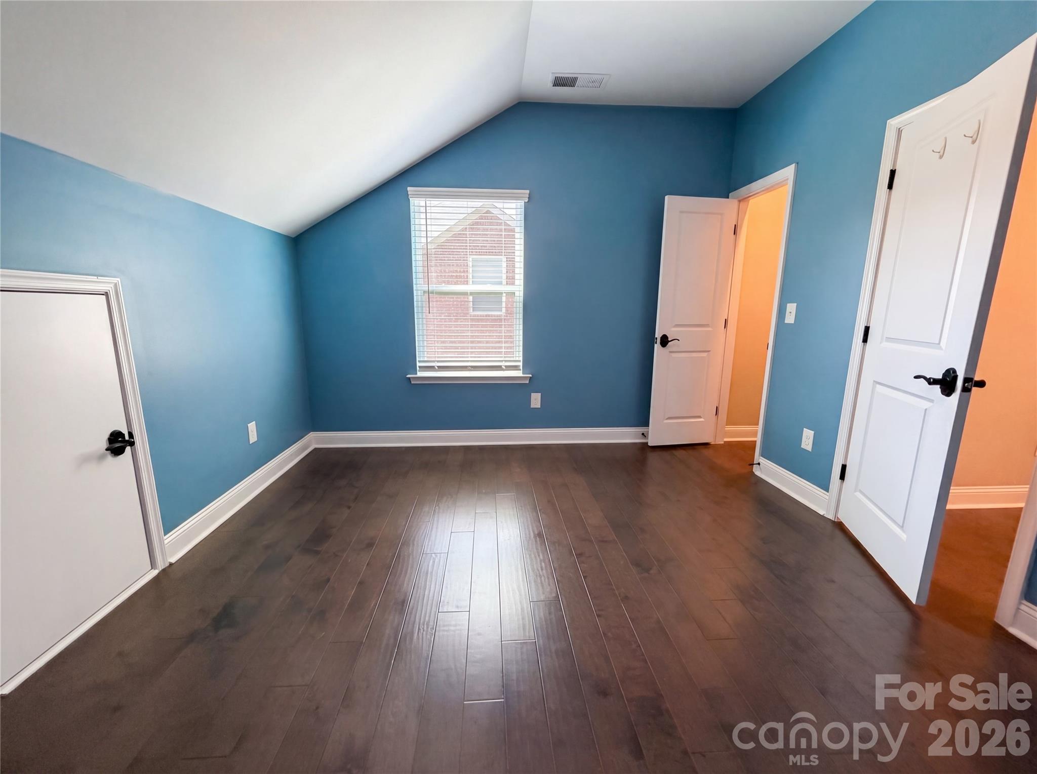 1321 Fishing Creek Road Clover, SC 29710 - Photo 11 of 19 an empty room with wooden floor and window