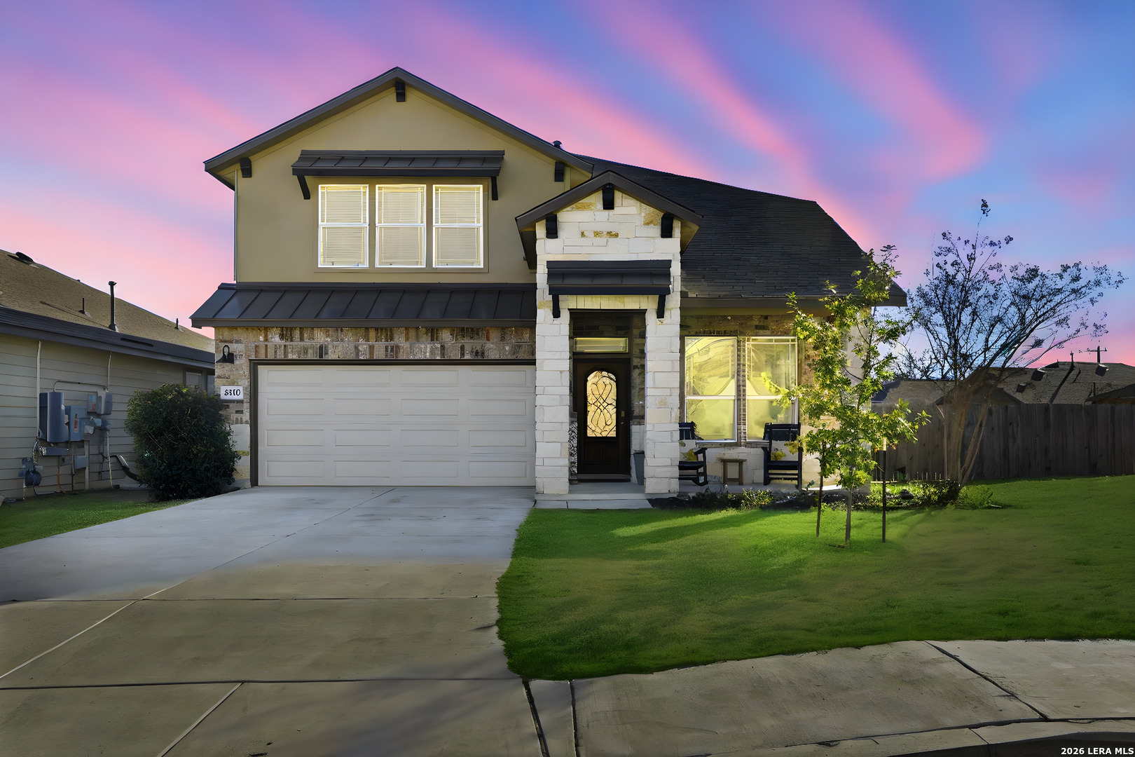 3410 Copper Acres Bulverde, TX 78163 - Photo 2 of 50 a front view of a house with a yard and garage