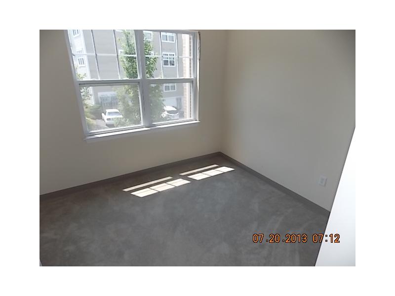 118 Mill Street, Unit 204 Woonsocket, RI 02895 - Photo 5 of 7 Bedroom.