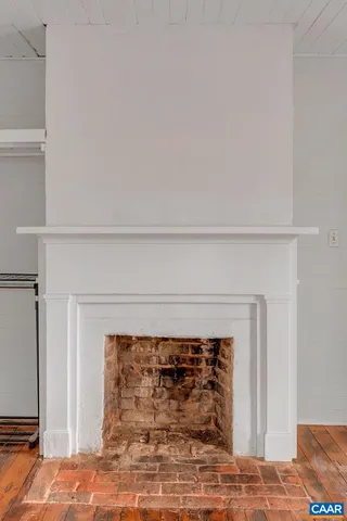 a living room with a fireplace