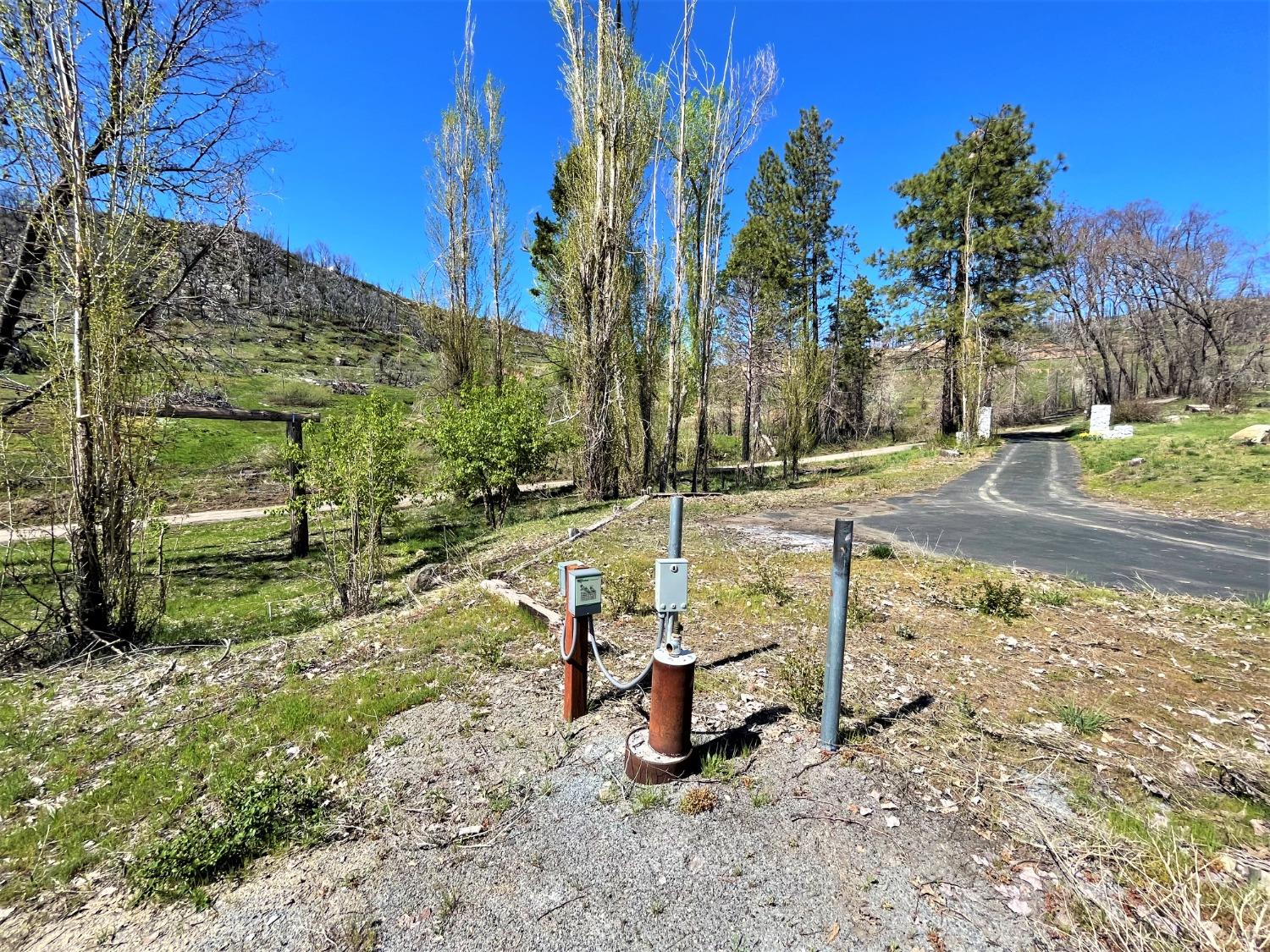 36021 Cressman Road Shaver Lake, CA 93602 - Photo 7 of 18 a view of a park with slide