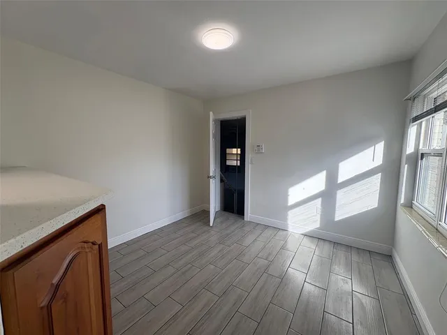 a view of a storage & utility room with two washing machine