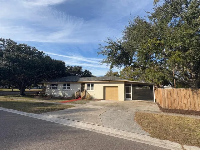 front view of a house with a street