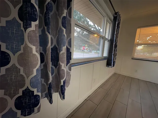 a view of walk in closet with window